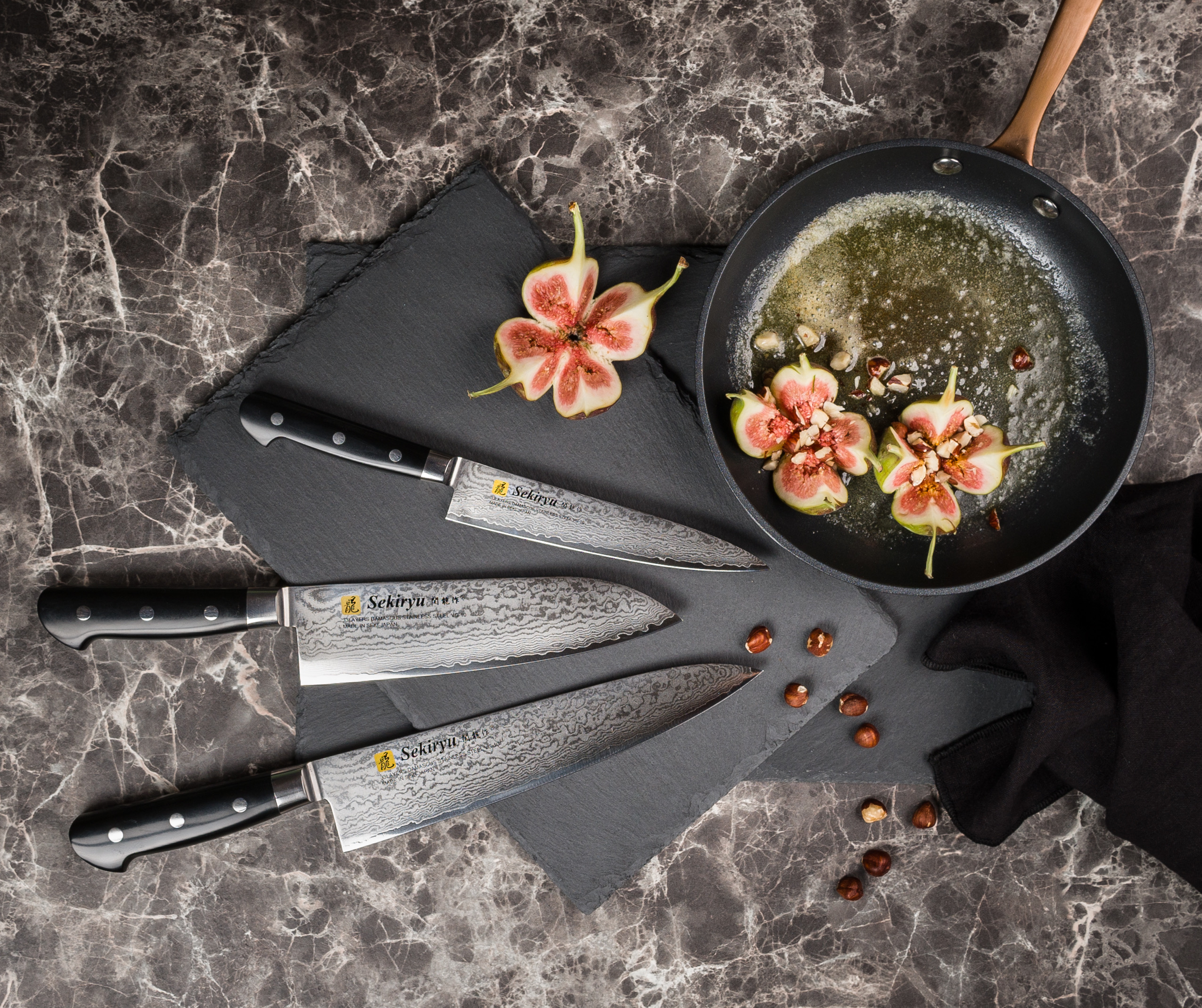 大理石とスレートの上、関龍作の包丁